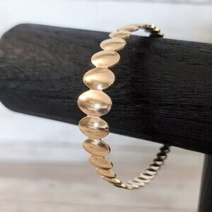 Gold Tone Oval Design Cuff Bracelet